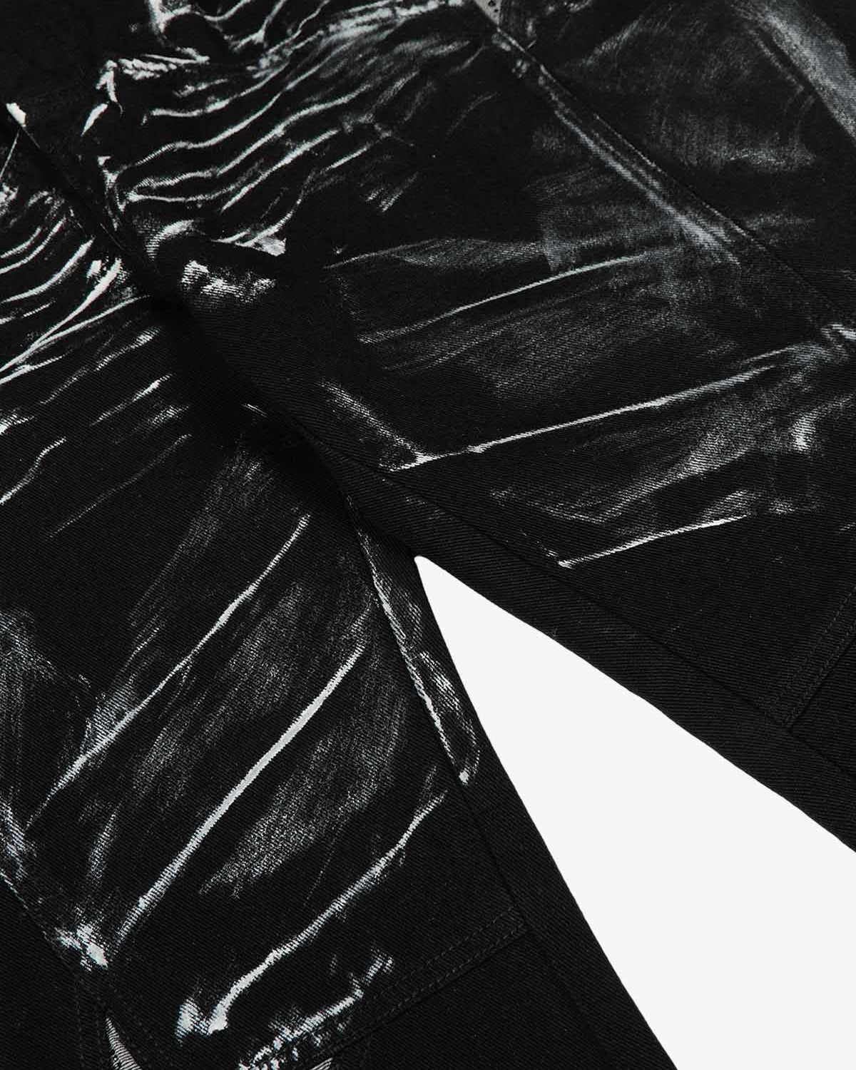 Black Star Paint Baggy Jeans featuring a wide-leg silhouette with abstract white streaks and star graphics, capturing a bold, artistic street-style aesthetic.