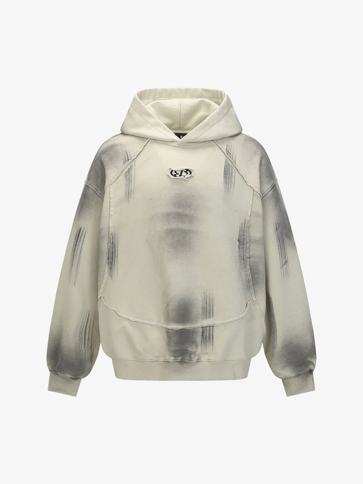 Ink Dyed Raw-Edge Streetwear Hoodie with spray-stenciled effect, exposed seams, and oversized fit, featuring a kangaroo pocket and small chest logo for bold street style.
