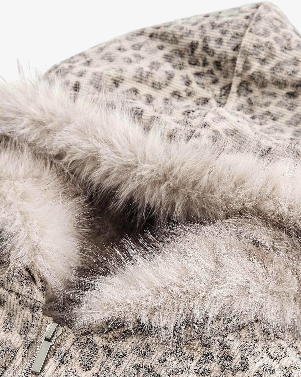 Leopard Faux Fur Hooded Jacket features a bold leopard print with a plush faux-fur trim and metal zipper, offering stylish warmth and streetwear appeal.