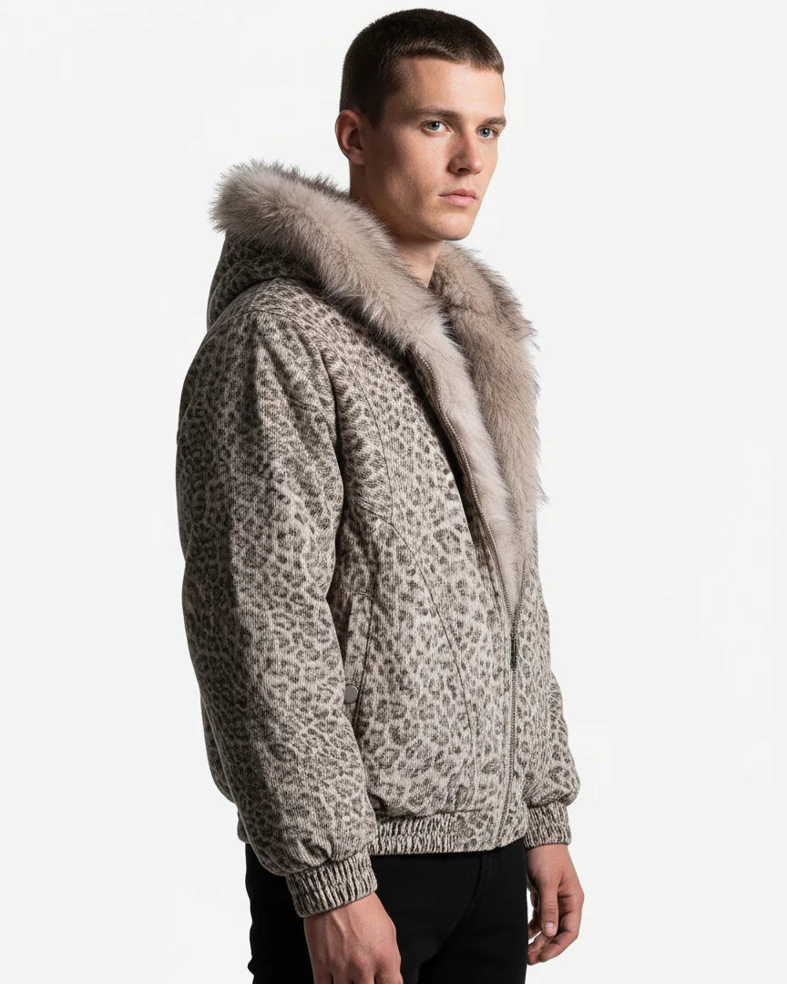 Young man models the Leopard Faux Fur Hooded Jacket, showcasing its plush fur-trimmed hood, leopard print, and elasticized details for a bold, warm streetwear look.