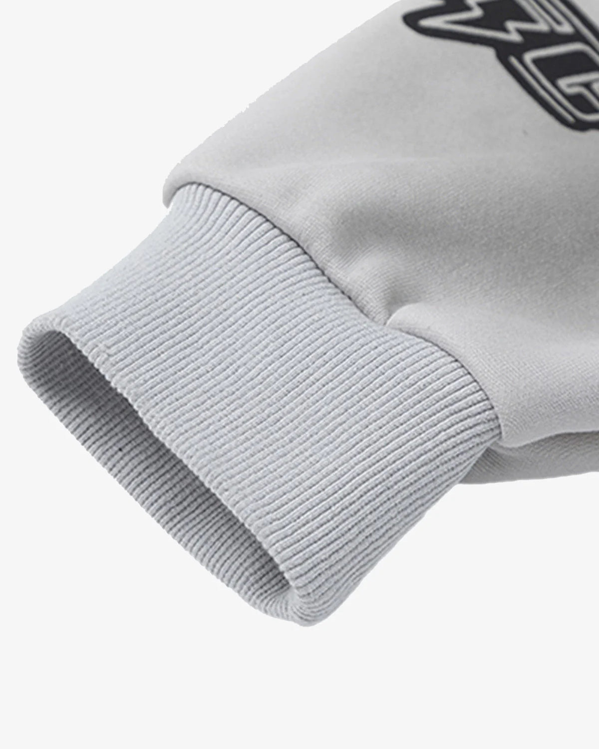 Close-up of Racing Graphic Distressed Streetwear Hoodie, highlighting the ribbed, elasticized wrist hem and smooth sleeve fabric, emphasizing its bold, motorsport-inspired streetwear style.