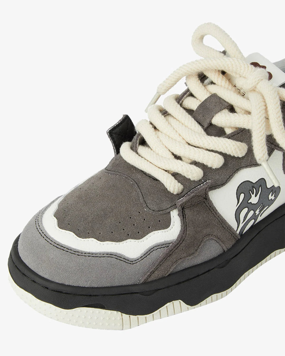 Vintage Chunky Graphic Skate Shoes with a chunky gray silhouette, cream laces, black midsole, and flame graphic, embodying retro skate style and streetwear flair.