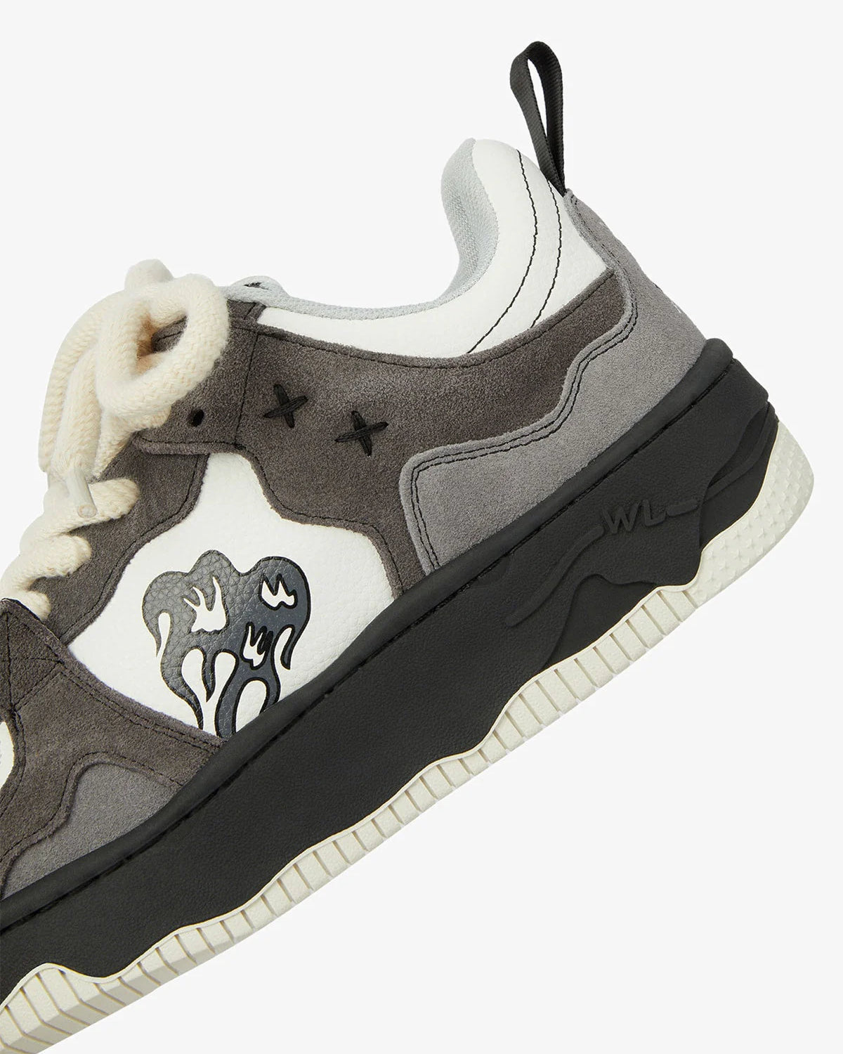 Vintage Chunky Graphic Skate Shoes with grey suede, white leather, chunky black midsole, creamy rope laces, and black drippy graphic, embodying retro skate style.