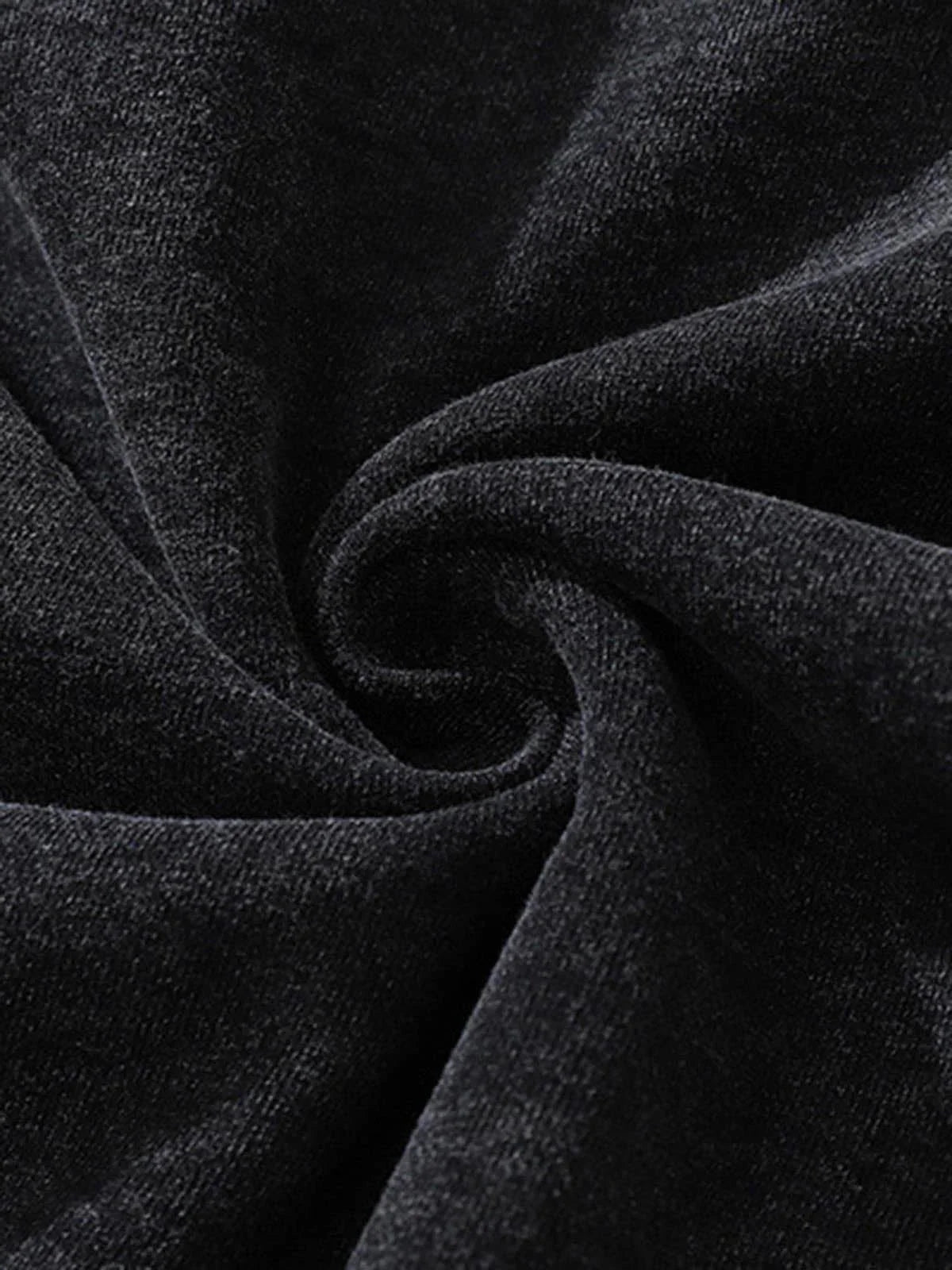 Vintage Doberman Graphic Streetwear Hoodie, showcasing its dark, textured fabric in a spiral, highlighting the bold, oversized front graphic and relaxed fit.