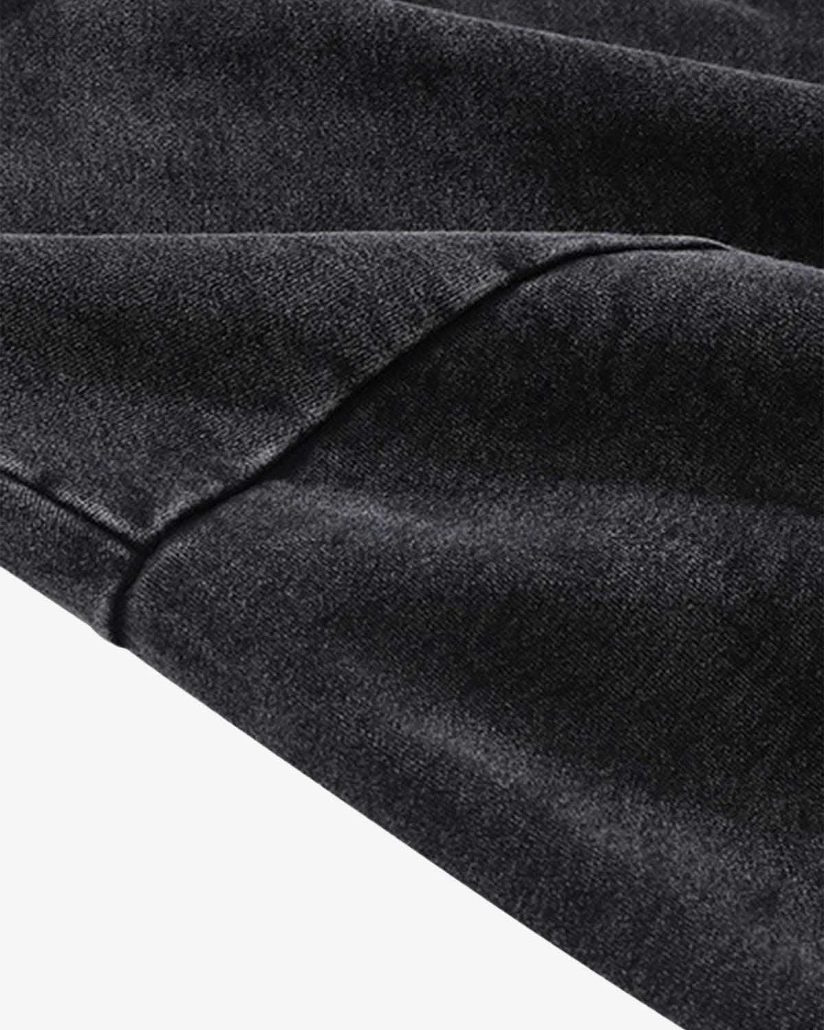 Vintage Doberman Graphic Streetwear Hoodie featuring dark fabric with visible stitching and folds, showcasing a bold, oversized Doberman graphic for a vintage urban look.