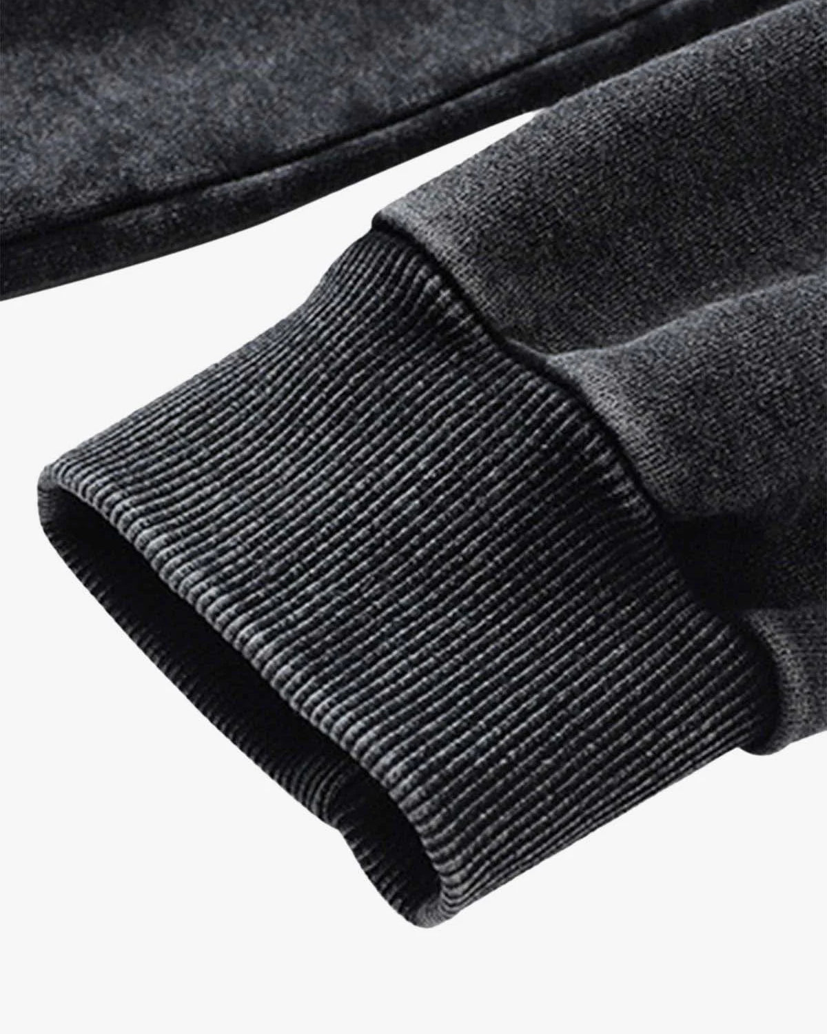Close-up of the rib-knit cuff on the Vintage Doberman Graphic Streetwear Hoodie's sleeve, showcasing its textured dark gray fabric and relaxed streetwear style.