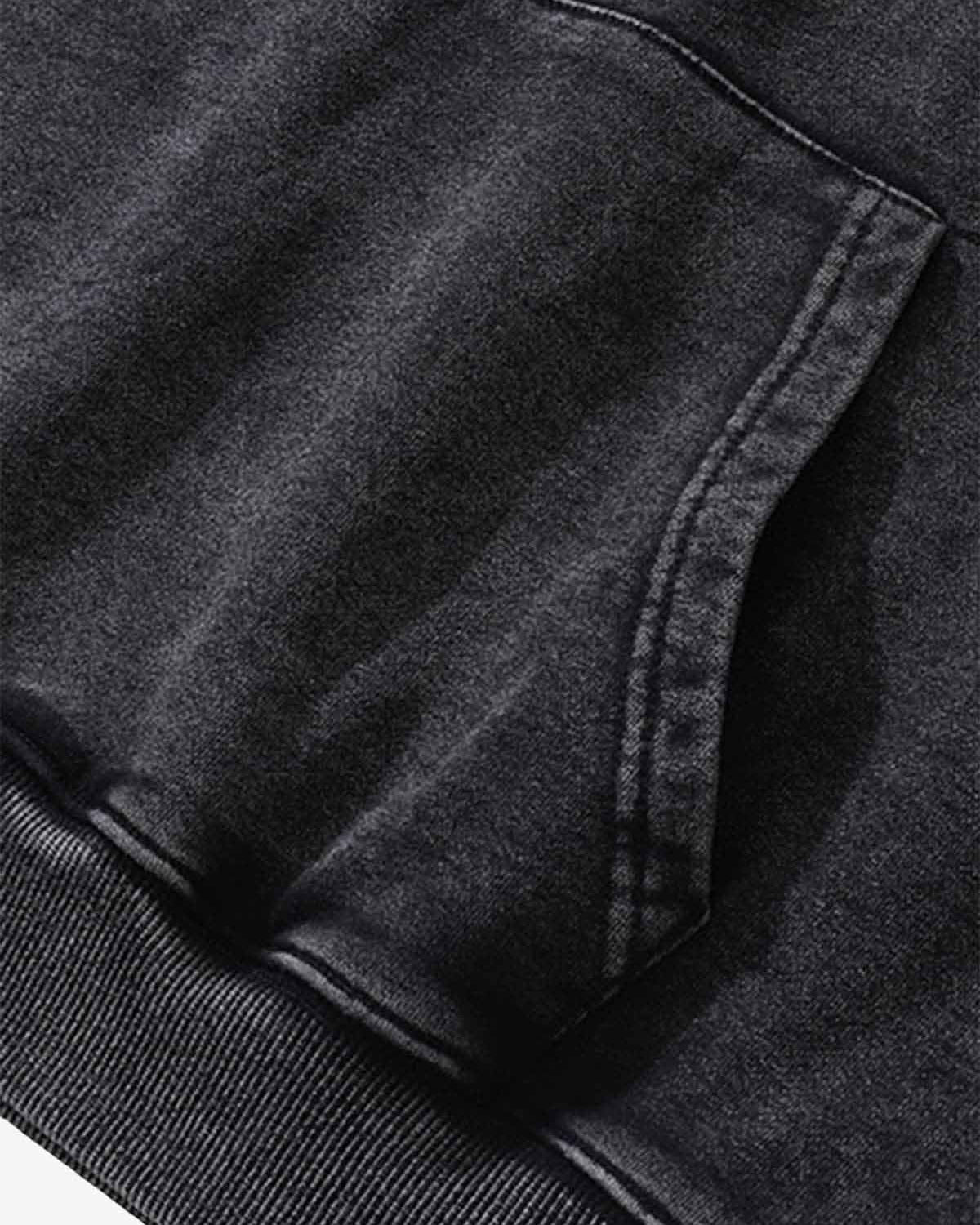 Close-up of the Vintage Doberman Graphic Streetwear Hoodie showing the kangaroo pocket and ribbed hem, highlighting its bold, washed streetwear aesthetic and relaxed fit.