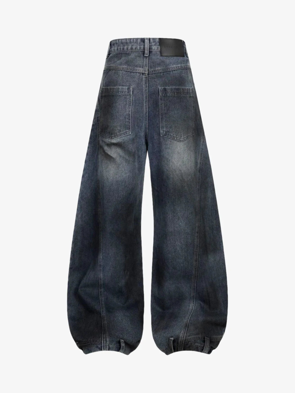 Vintage Washed Baggy Ripped Jeans with balloon-style legs, elastic cuffs, patch pockets, and a small waistband patch; exuding a grunge, streetwear vibe.
