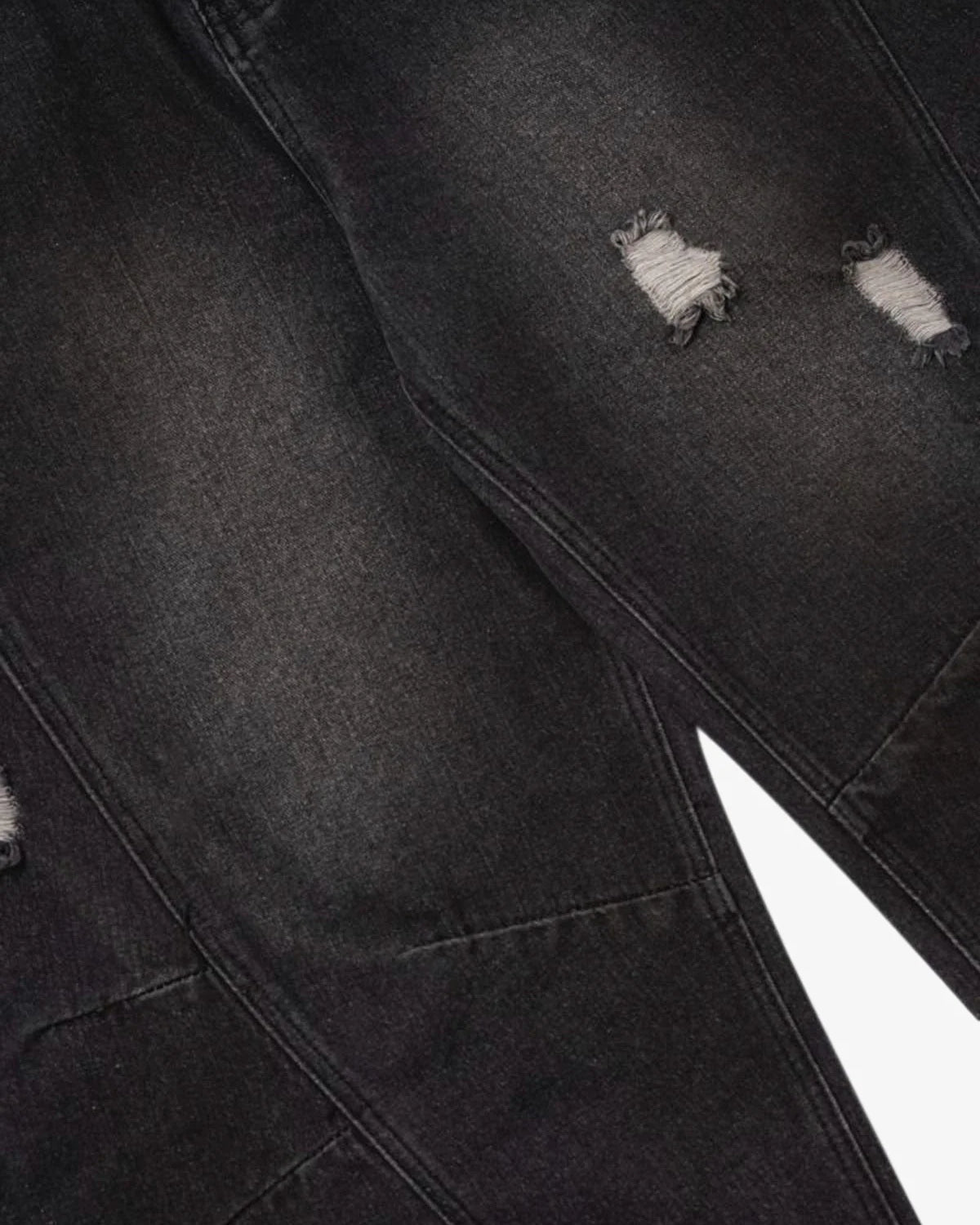 Vintage Washed Baggy Ripped Jeans with dark distressed denim, featuring frayed holes, reinforced stitching, and an oversized fit for a grunge-inspired streetwear look.