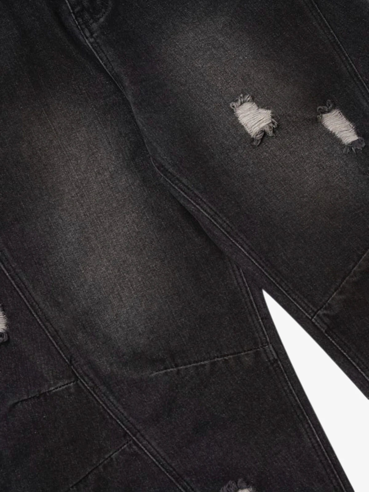 Vintage Washed Baggy Ripped Jeans with dark distressed denim, featuring frayed holes, reinforced stitching, and an oversized fit for a grunge-inspired streetwear look.