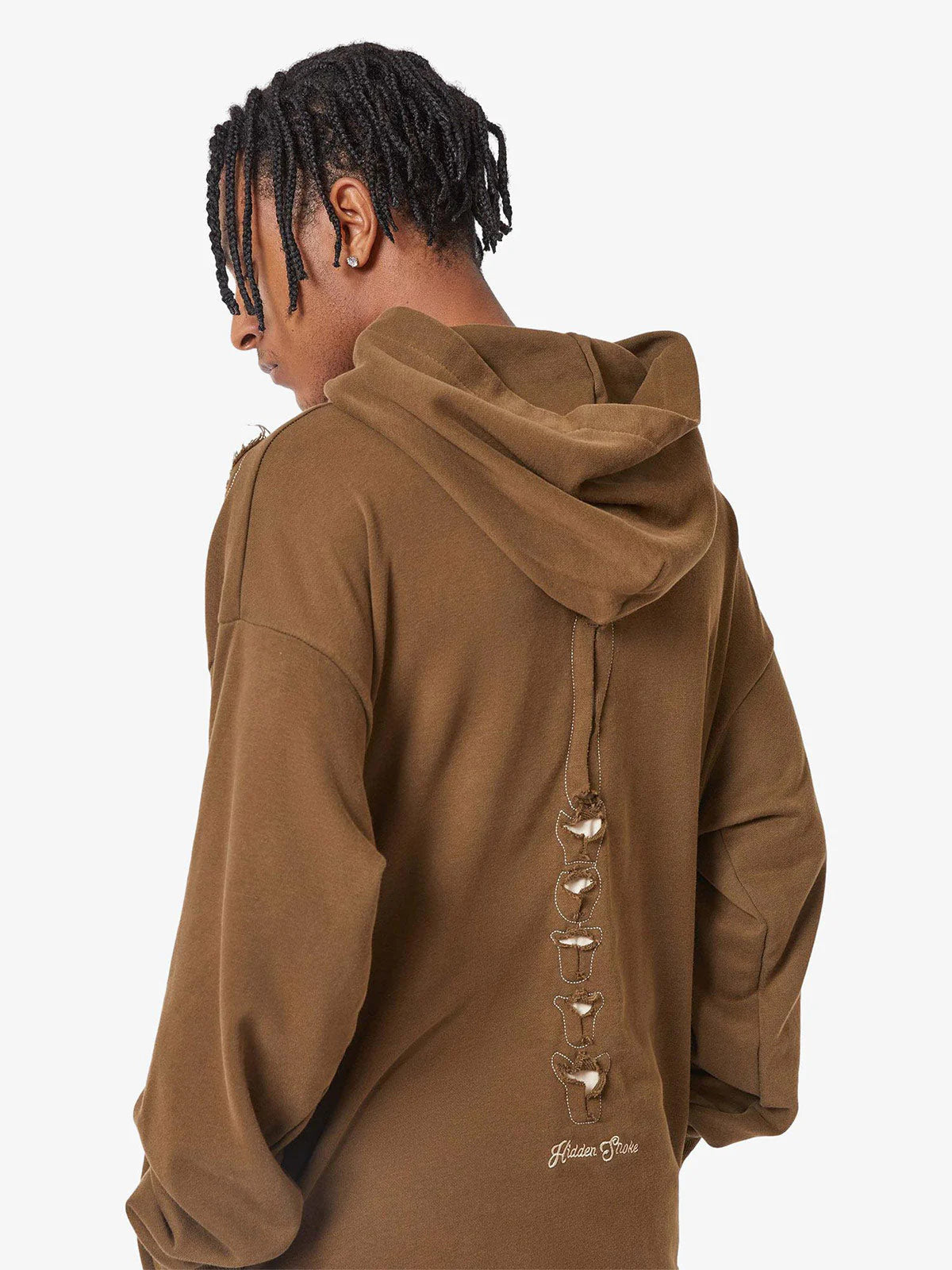 Back view of Washed Skeleton Graphic Streetwear Hoodie with bird-skull cutouts and Hidden Smoke embroidery, showcasing its oversized fit and vintage streetwear style.