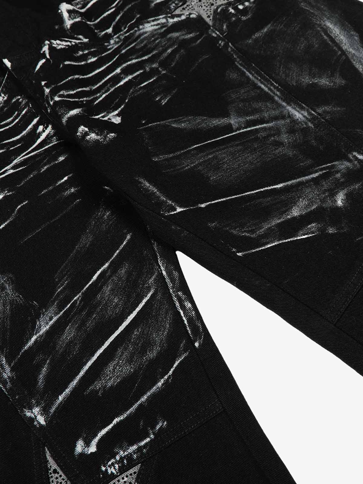 Black Star Paint Baggy Jeans featuring a wide-leg silhouette with abstract white streaks and star graphics, capturing a bold, artistic street-style aesthetic.