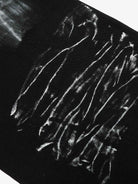 Black Star Paint Baggy Jeans featuring a wide-leg silhouette with off-white brush-stroke graphics, offering a bold, artistic streetwear aesthetic.