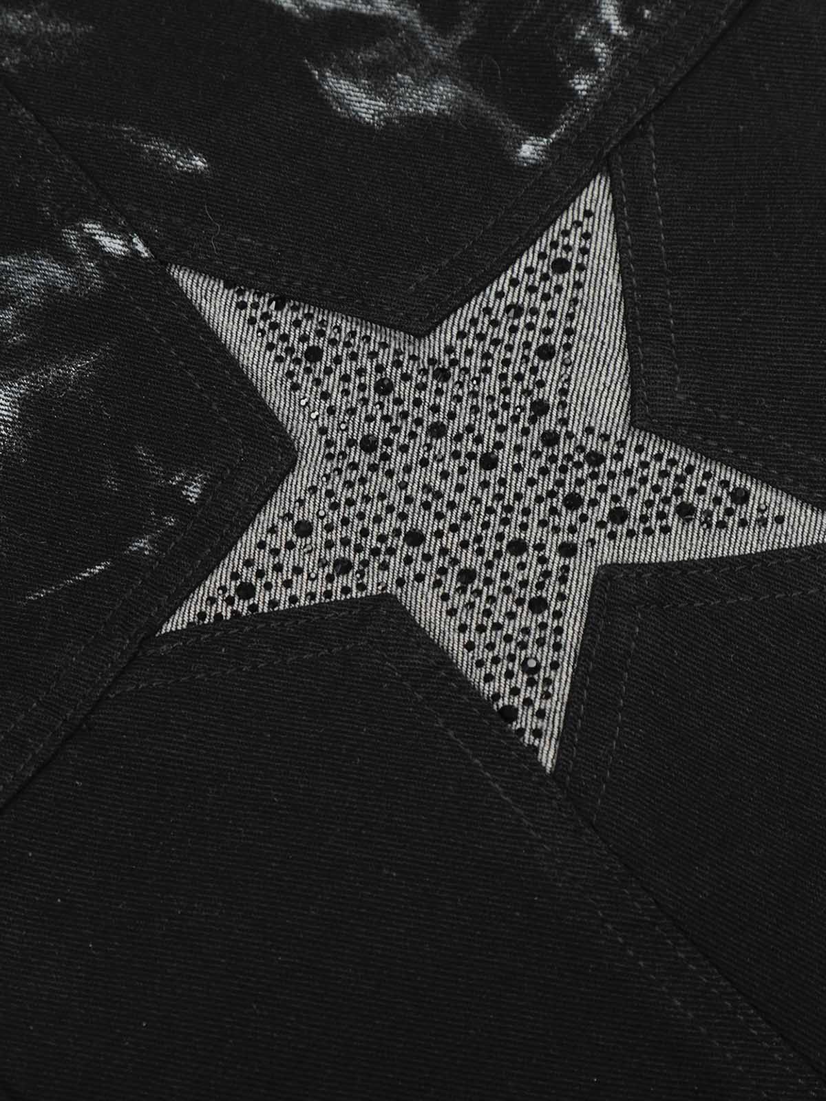 Black Star Paint Baggy Jeans feature a star-shaped inset with dot embellishments on black fabric, showcasing bold, artistic street-style aesthetics and oversized design.