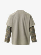 Distressed Grunge Layered T-Shirt featuring a muted olive short-sleeve with built-in woodland camo long sleeves, showcasing a relaxed streetwear fit.