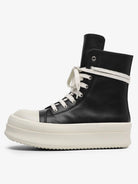 High-Top Platform Streetwear Sneakers in black leather feature a tall upper, cream laces, thick off-white sole, and a bold fashion-forward design.