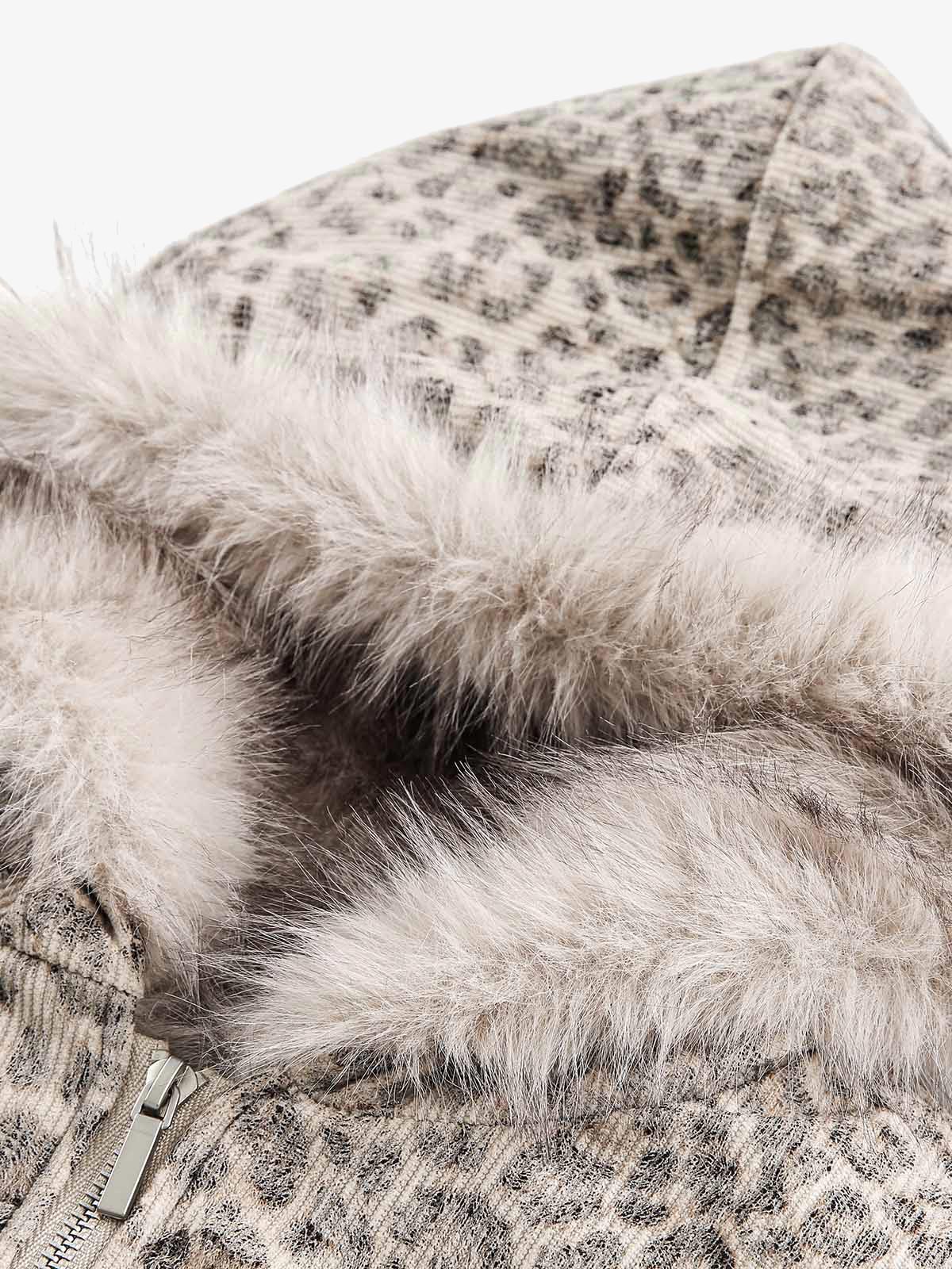 Leopard Faux Fur Hooded Jacket features a bold leopard print with a plush faux-fur trim and metal zipper, offering stylish warmth and streetwear appeal.