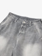 Retro Washed Grey Baggy Jeans; upper view showing faded wash, waistband with belt loops, metal button, and angled front pockets, highlighting vintage streetwear style.