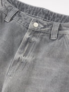 Close-up of Retro Washed Grey Baggy Jeans showing waistband details with belt loops, button closure, and pocket stitching, highlighting vintage-inspired streetwear style.