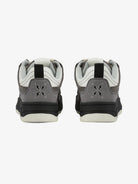 Back view of Vintage Chunky Graphic Skate Shoes, featuring grey suede heel panels, black midsoles, and white leather uppers, showcasing stitched logos and black heel pull-tabs.