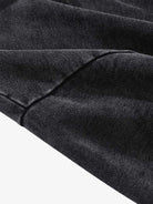 Vintage Doberman Graphic Streetwear Hoodie featuring dark fabric with visible stitching and folds, showcasing a bold, oversized Doberman graphic for a vintage urban look.