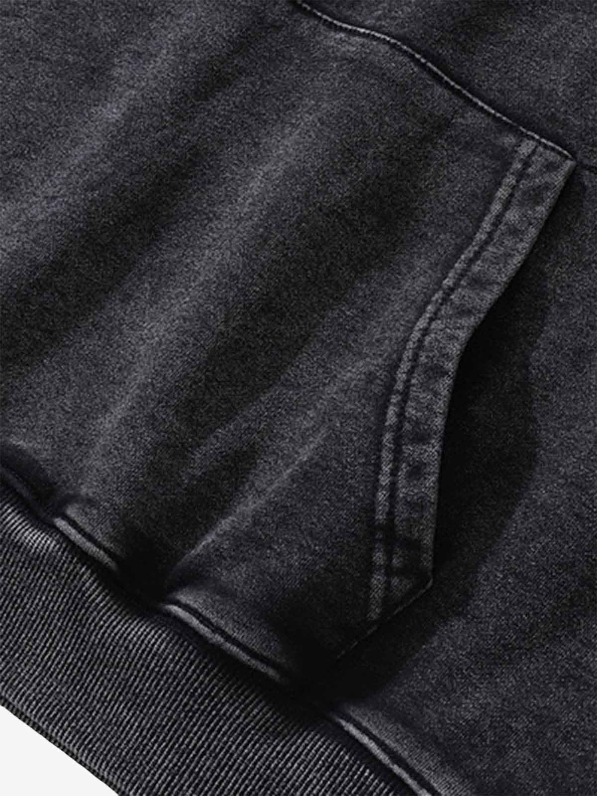 Close-up of the Vintage Doberman Graphic Streetwear Hoodie showing the kangaroo pocket and ribbed hem, highlighting its bold, washed streetwear aesthetic and relaxed fit.