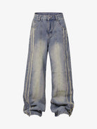 Washed Distressed Raw-Edge Baggy Jeans with wide-leg, vertical seam detailing, five-pocket styling, and slouchy silhouette, embodying a Y2K, grunge-inspired streetwear look.