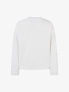 Back view of the White Waffle Cross Graphic Long Sleeve T-Shirt, showcasing its waffle texture and simple crew neckline, embodying a vintage streetwear aesthetic.